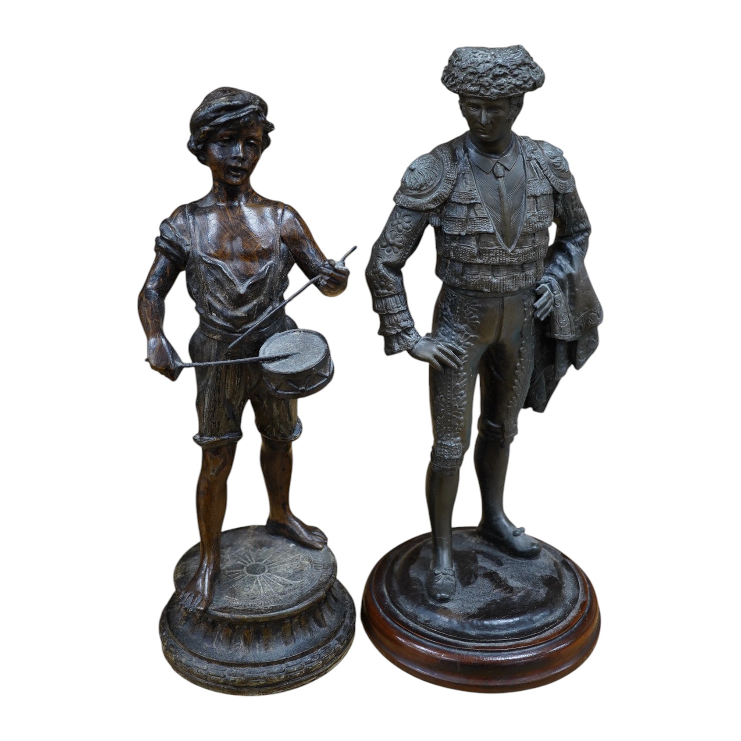 Two spelter figures, including a matador raised on turned wood base, 38cm high. Condition - fair